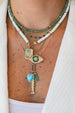 Large 14K Gold Diamond Emerald Baguette Evil Evil Charm